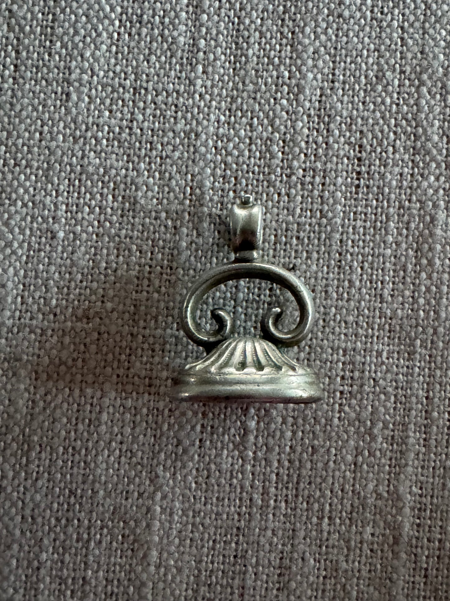 small antique sterling silver fob with carved glass intaglio
