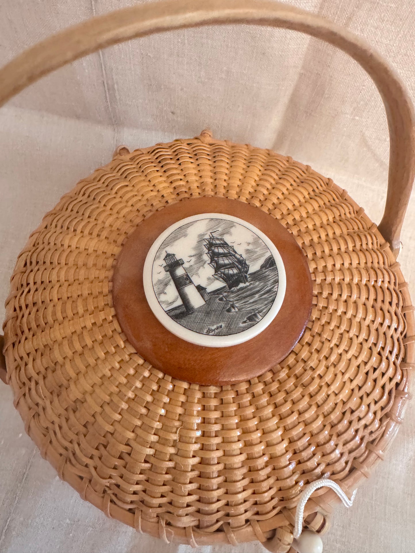 Medium Round Basket with Reproduction Scrimshaw Lighthouse and Schooner