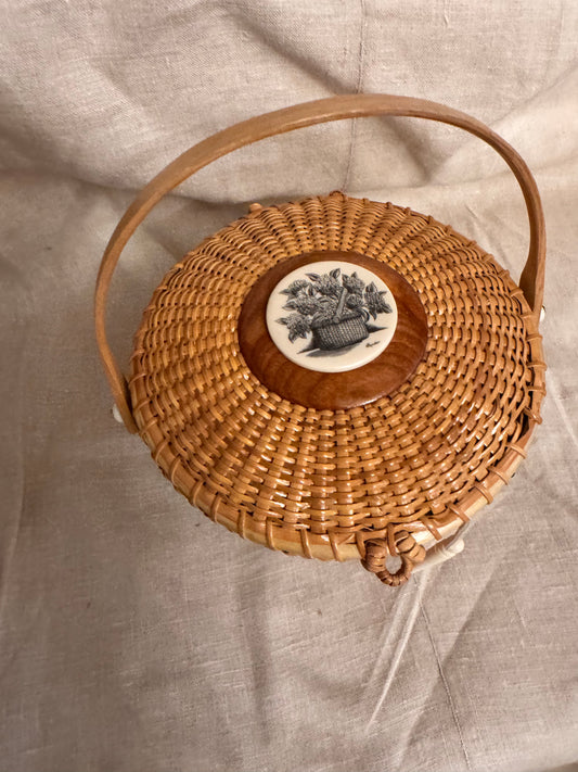 Medium Round Basket with Scrimshaw Nantucket Basket of Flowers