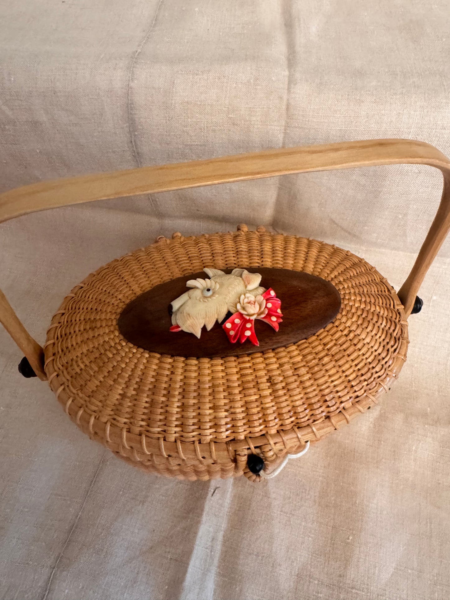 Large Oval Nantucket Basket with Utterly Charming Celluloid Scottie with Polka Dot Bow